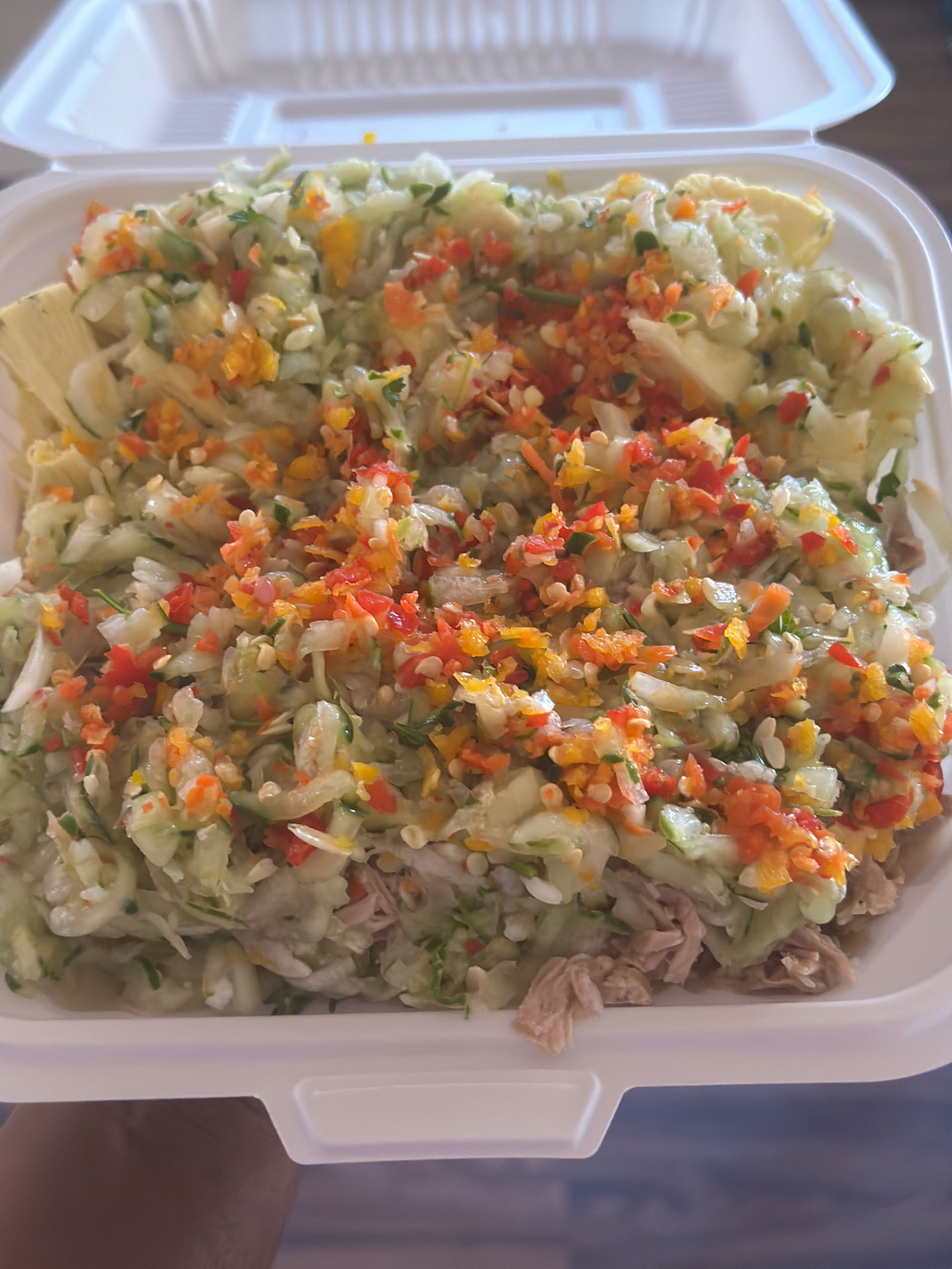 Souse topped with fresh pickle and plenty of chopped pepper